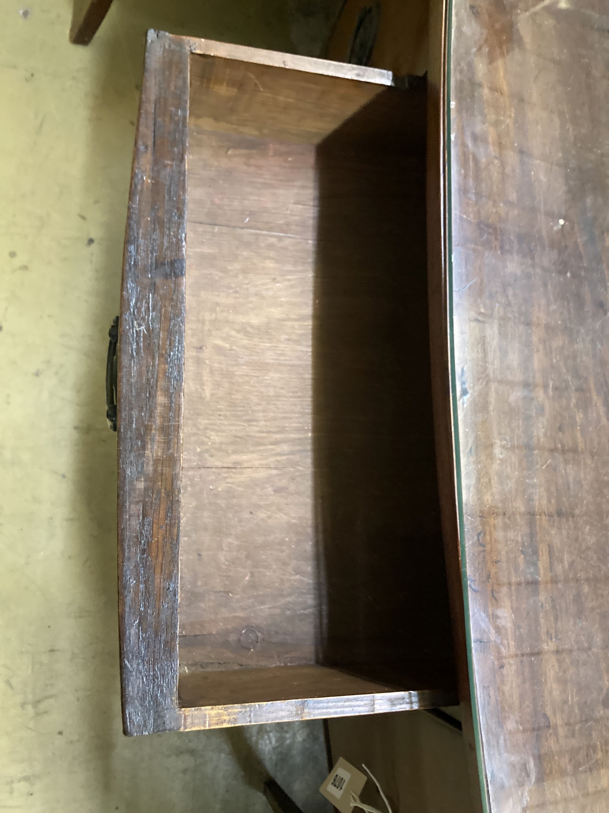 A Georgian mahogany bow front sideboard, fitted with oval brass drop handles, on square tapering supports, length 113cm, depth 48cm, he